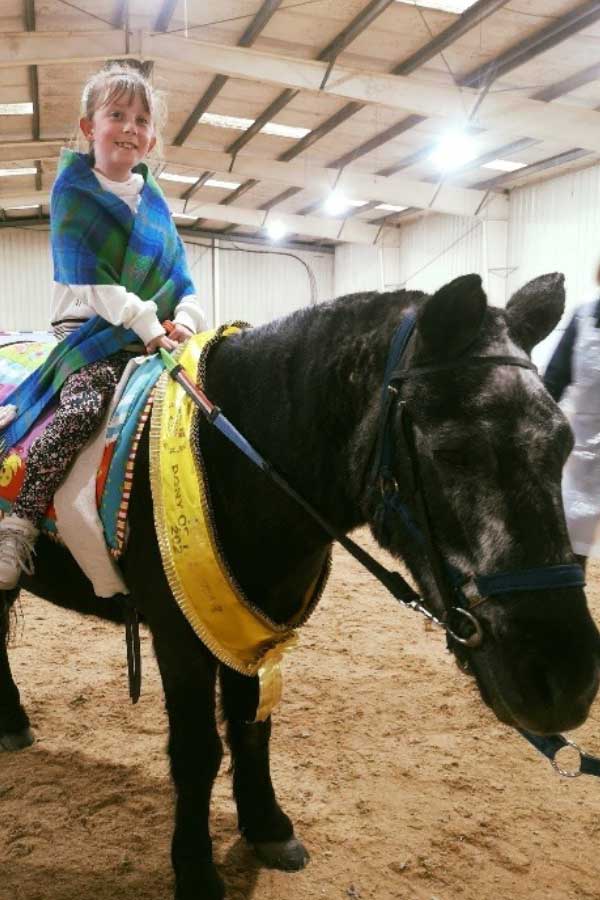 Smudge with rider - Glasgow Riding Disabled Association